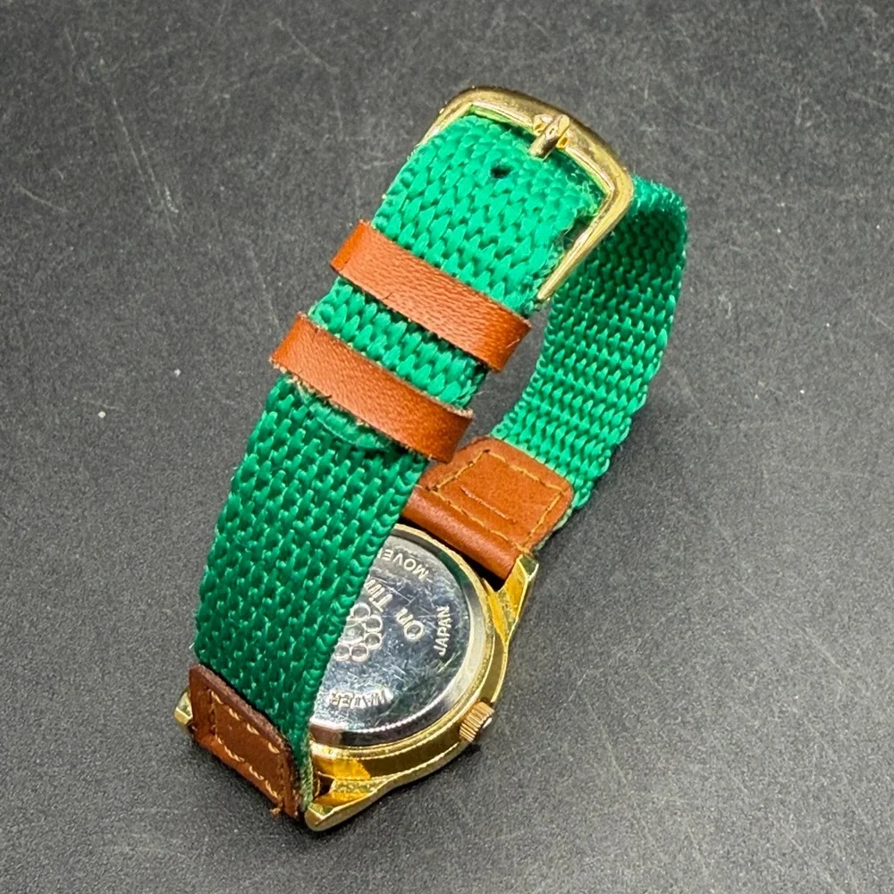Vintage On Time Goldtone Pinnochio & Dog Watch Green Fabric Band Untested